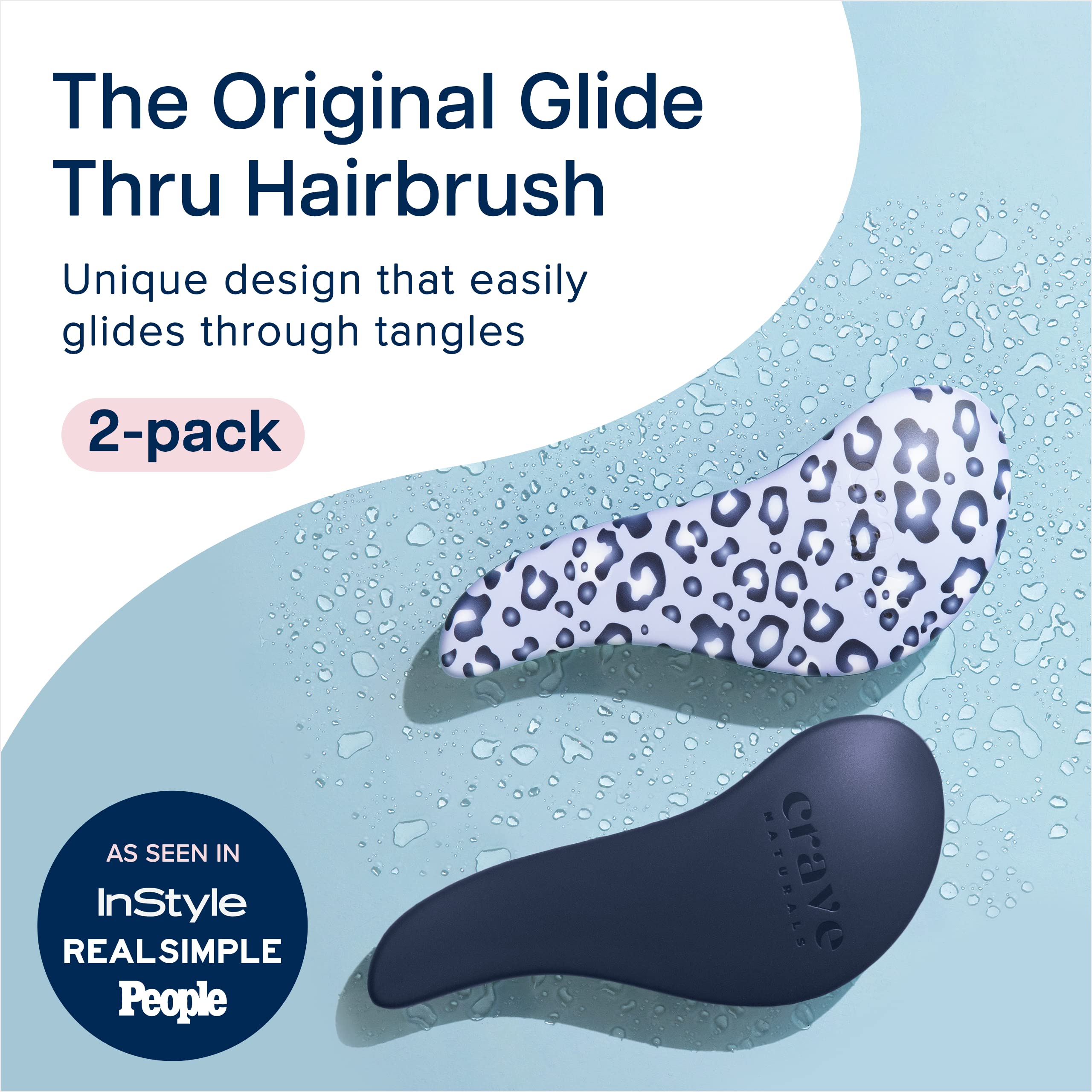 Crave Naturals Glide Thru detangling brush held in hand shows comfortable grip for kids and adults