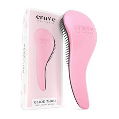 Crave Naturals Glide Thru pink detangling brush close-up easing knots