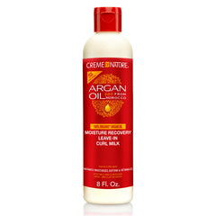 Creme of Nature Moisture Recovery Leave-In Curl Milk bottle pour highlights easy, lightweight hydration
