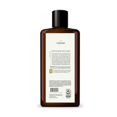 Cremo Bourbon & Oak body wash bottle side view shows rich lather and moisturizing feel.