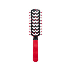 Cricket Static Free Fast Flo Color Vent Hair Brush in red close-up shows anti-static detangling benefits.