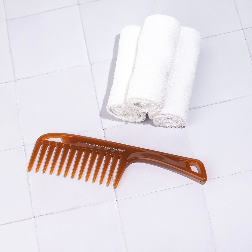 Cricket Ultra Smooth Detangler Comb extended handle for better control on long hair.