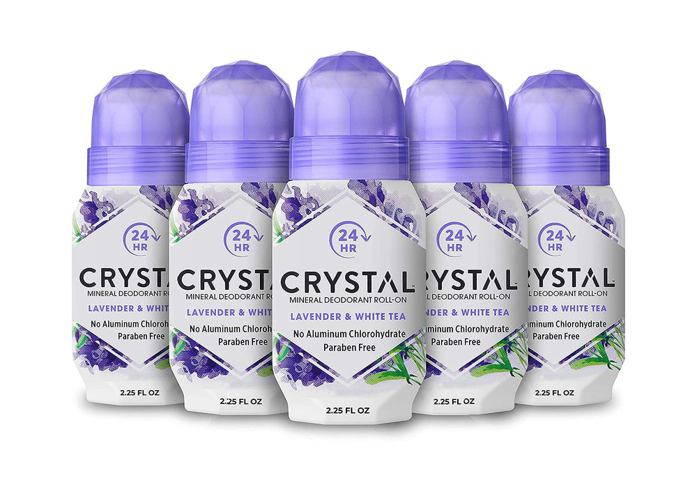 Crystal Essence CRYSTAL deodorant roll-on bottle shows mineral barrier for odor control.