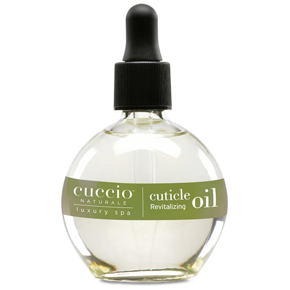 Cuccio Naturale Revitalizing Cuticle Oil bottle closeup showing a hydrating formula.