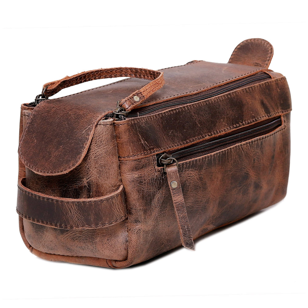 Cuero premium buffalo leather toiletry bag closeup showing rich patina and texture