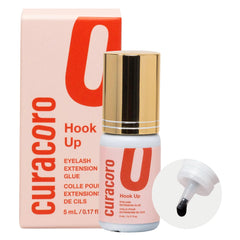 Curacoro eyelash glue in clear bottle shows professional, precise application capability.