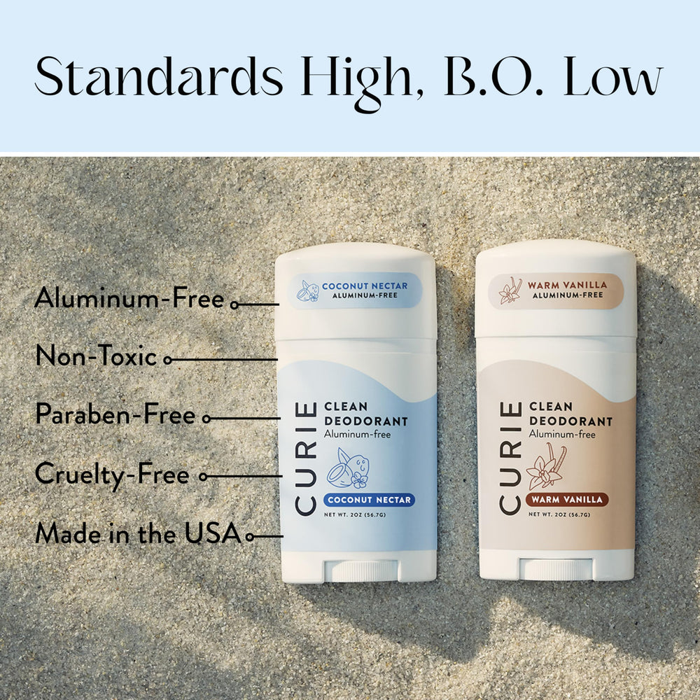 Curie Coconut Nectar Warm Vanilla deodorant on bathroom counter with soft lighting.