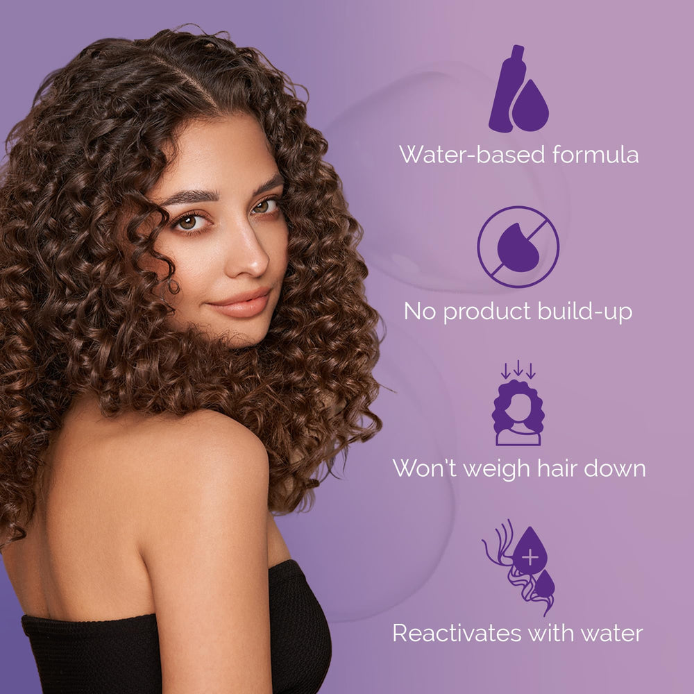 Application of Curl Keeper on wet hair with brush for even coverage