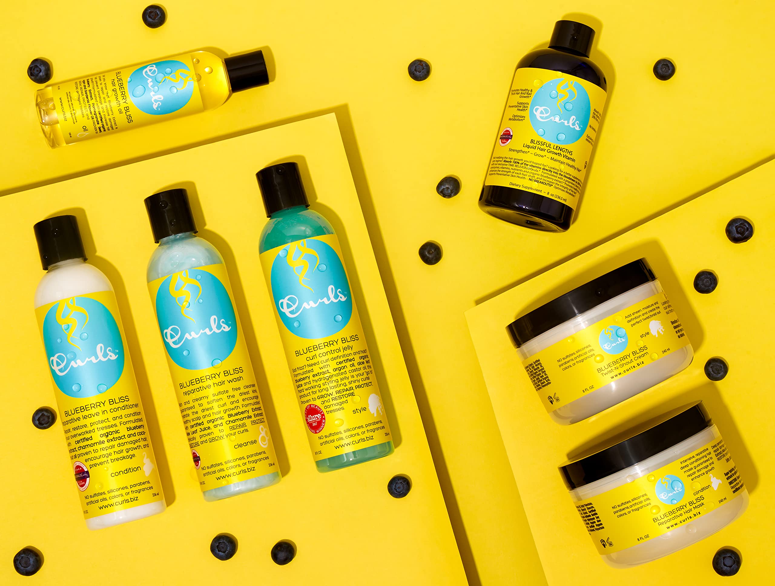 Curls Blueberry Bliss collection packaging highlights silicone-free formula for healthy curls.