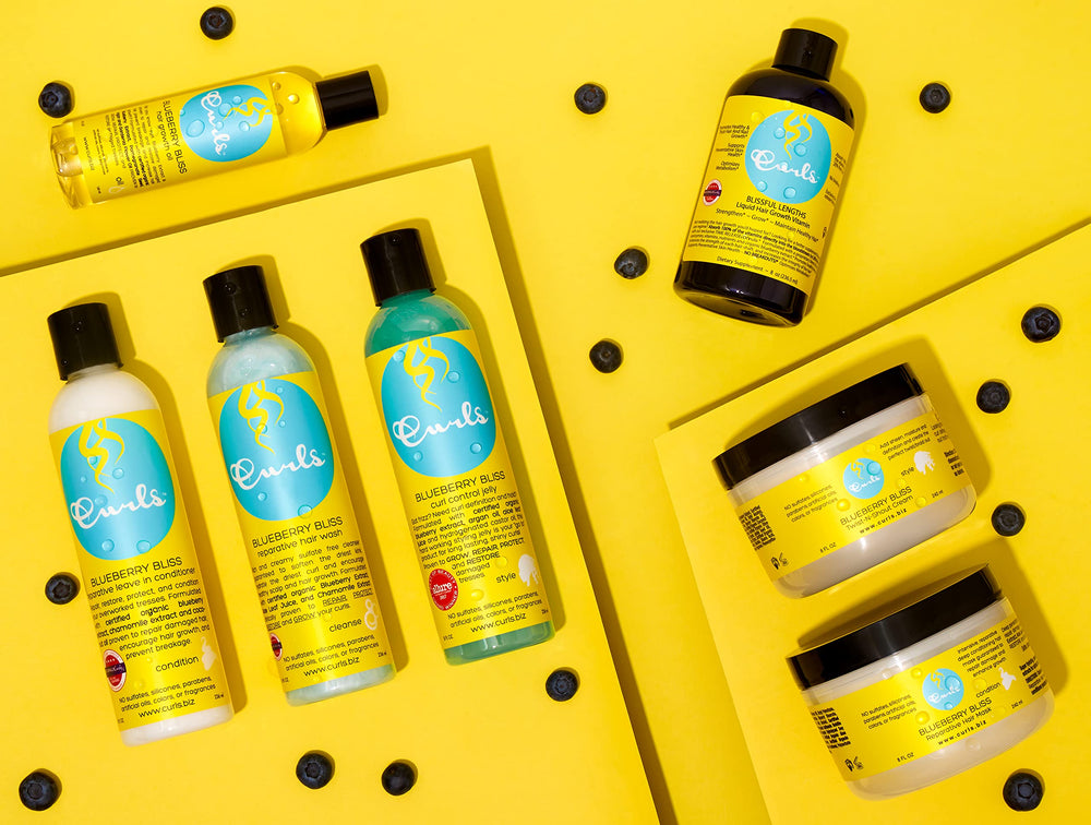 Curls Blueberry Bliss collection packaging highlights silicone-free formula for healthy curls.