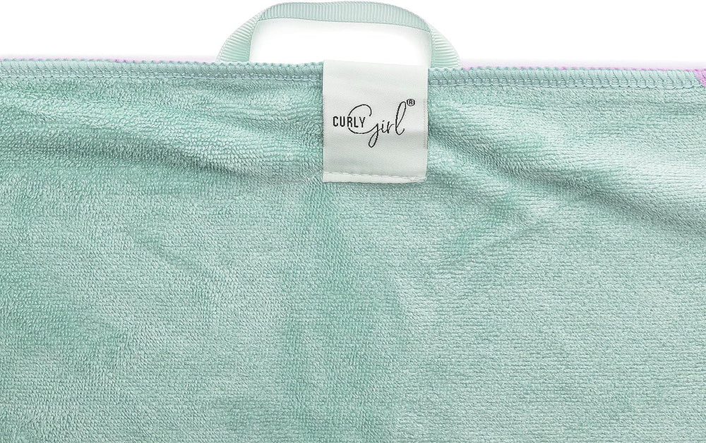 Curly Girl towel for women with curls reduces frizz while drying.