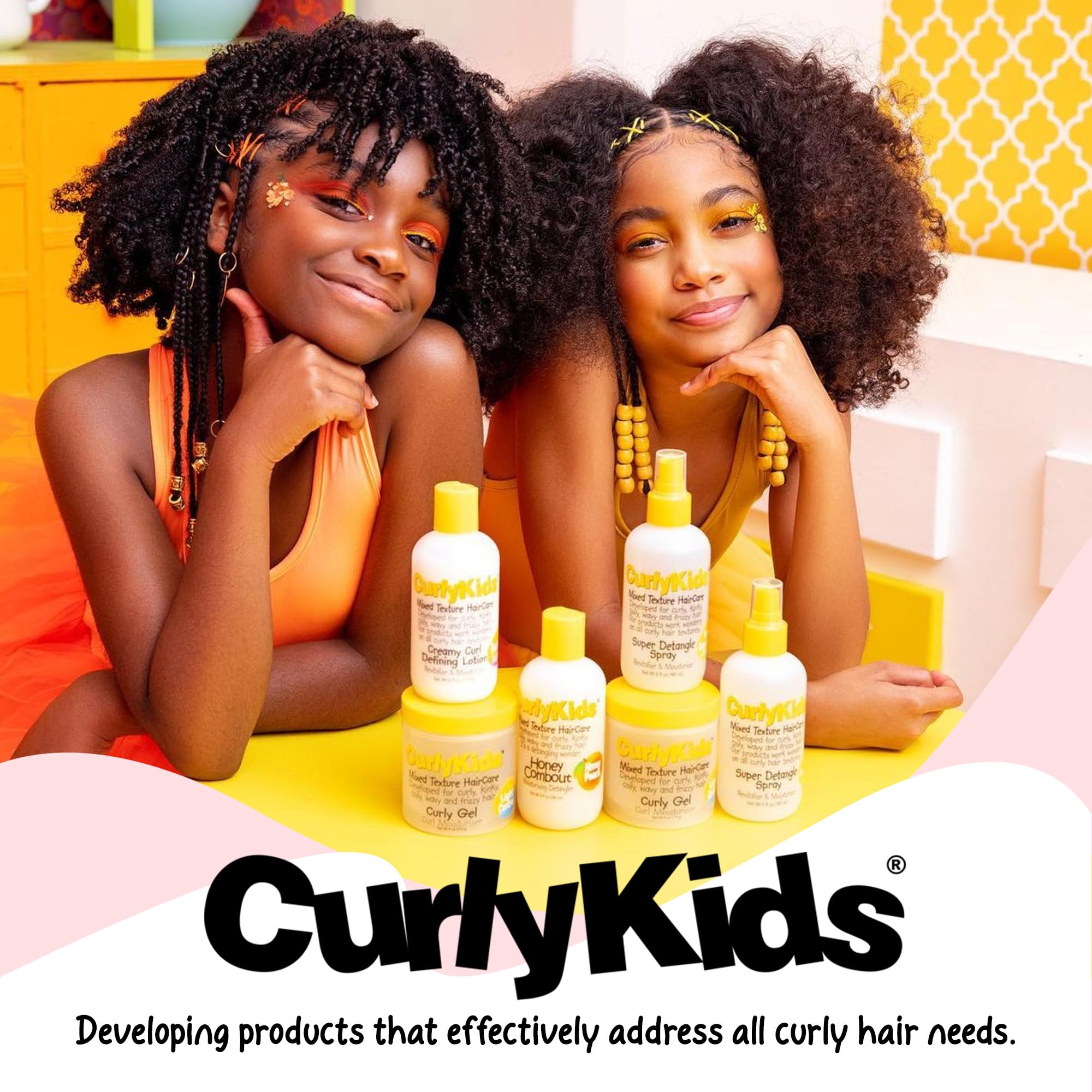 CurlyKids child smiling with curls—joyful, frizz-controlled routine