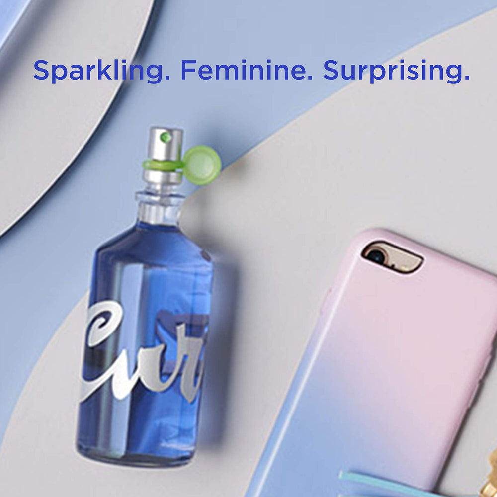 Curve Eau De Toilette as a woman applies fragrance for all-day freshness.