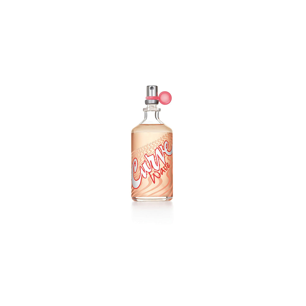 Curve Wave mid-notes plumeria driftwood close-up evokes warm beach vibes.
