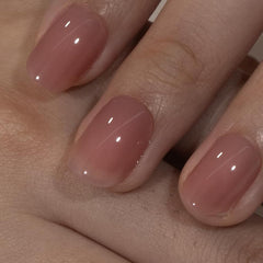 Curvlife soft gel press-on nails honey peach pink oval pack shot with natural fit