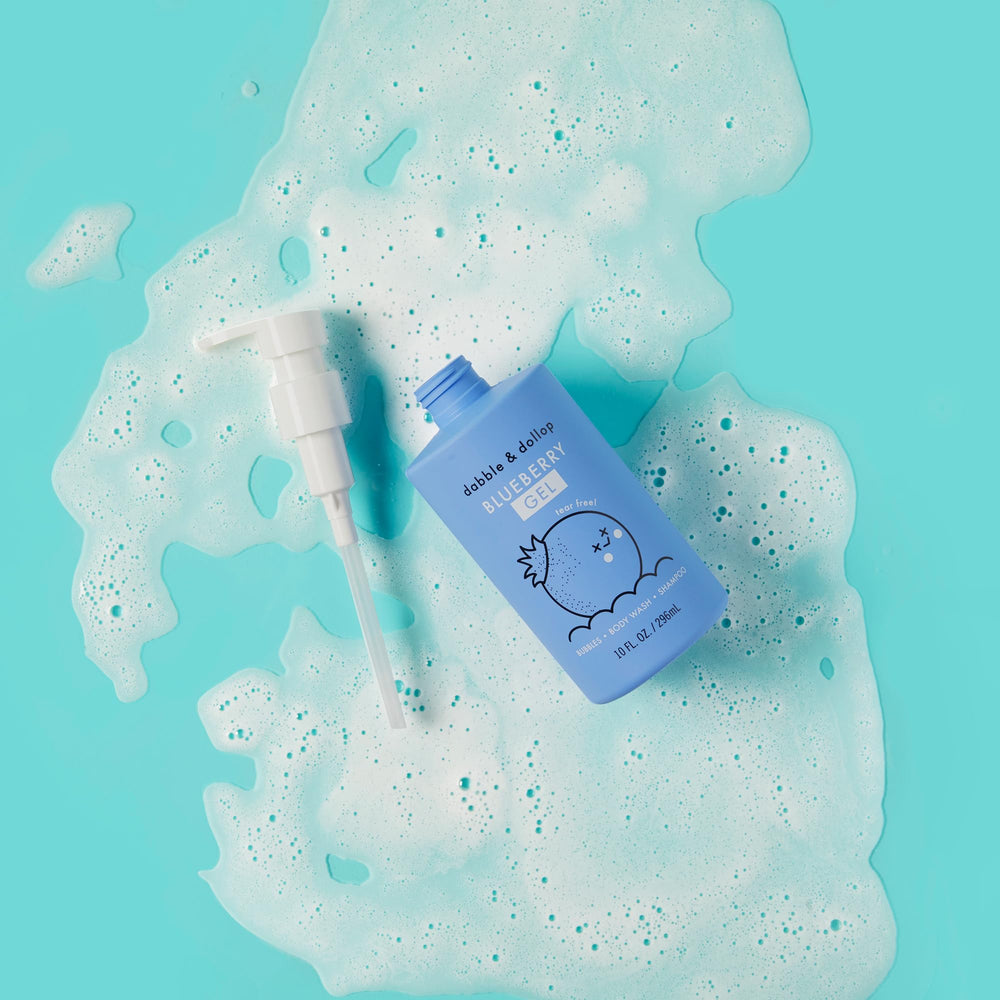 Dabble & Dollop Blueberry 3-in-1 bottle with foamy cleansing lather for kids.