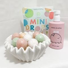 Dabble & Dollop coconut 3-in-1 cleanser bottle; all-in-one kid cleansing.