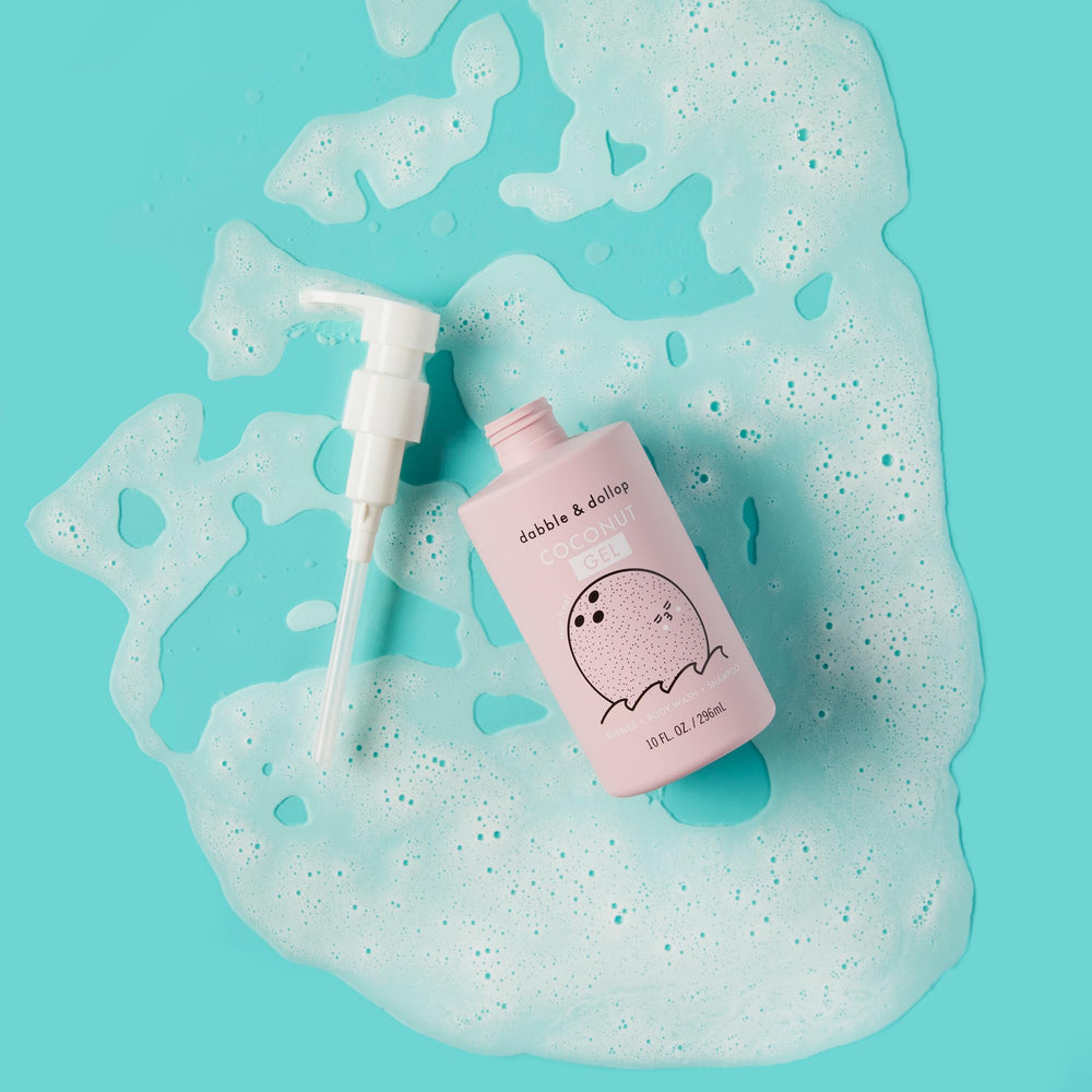 Dabble & Dollop kids bath time scene; tropical bubbles and smiles.