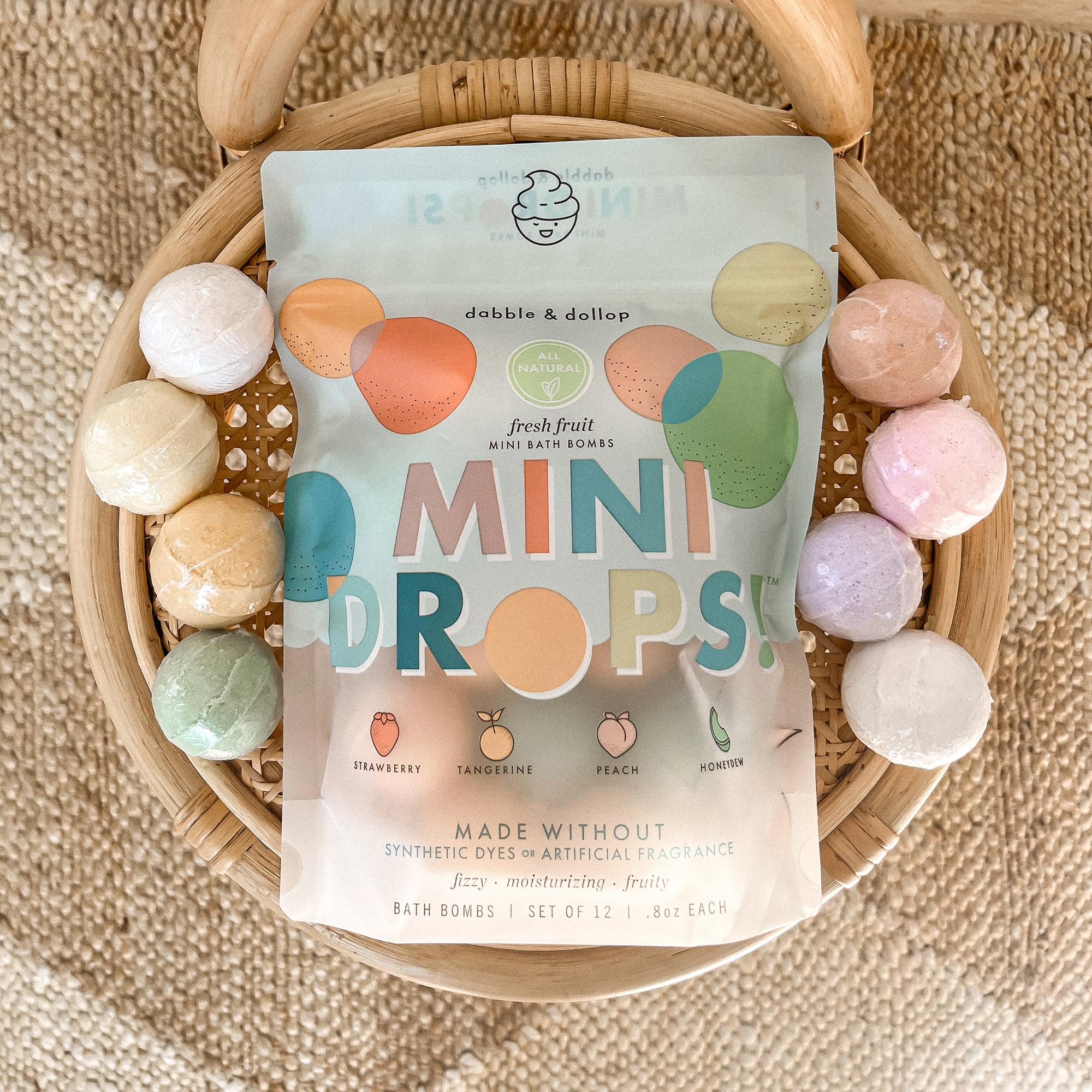 Dabble & Dollop peach bath bombs in pouch with gentle moisturizing aroma
