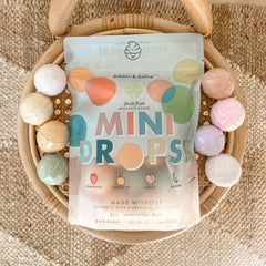 Dabble & Dollop peach bath bombs in pouch with gentle moisturizing aroma