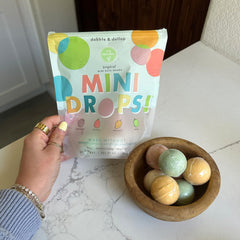 Dabble & Dollop mini bath bombs tropical mango close-up release bright scent and gentle bubbles