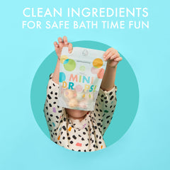Dabble & Dollop tropical bath bombs fizz close-up; playful bath time.