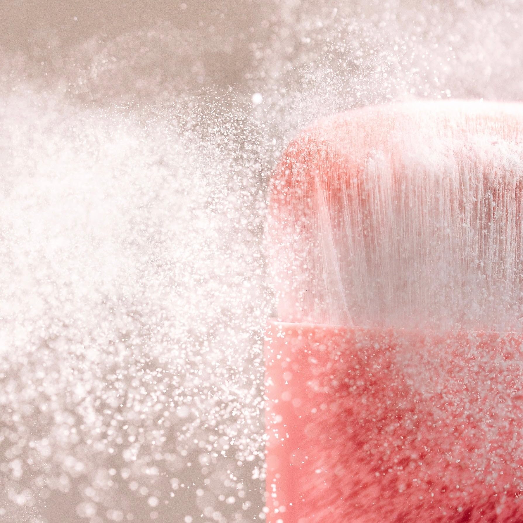 DAE Fairy Duster brush with bottle for easy application on the go.