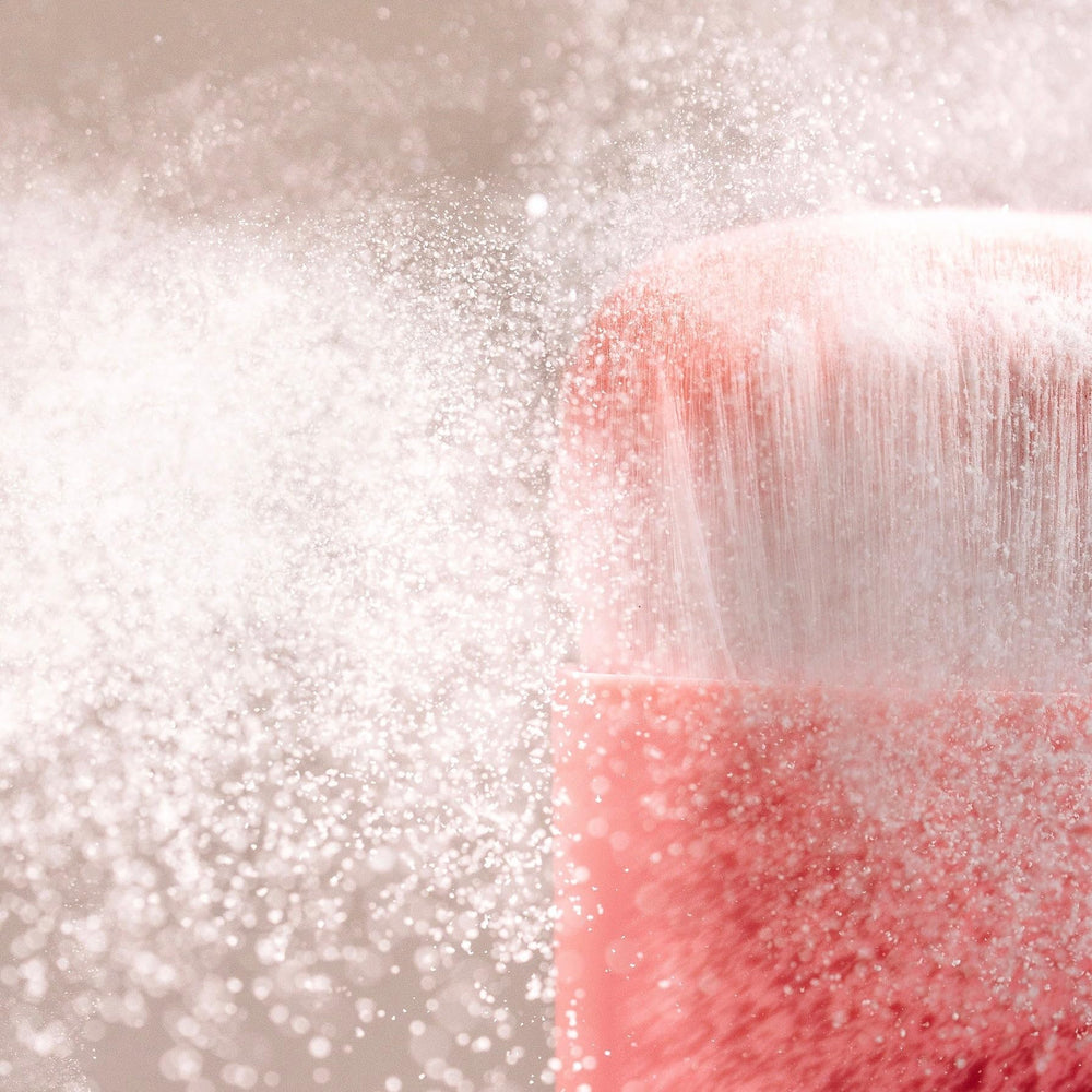 DAE Fairy Duster brush with bottle for easy application on the go.