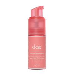 DAE Fairy Duster dry shampoo bottle with powder, absorbing oil for refreshed roots.