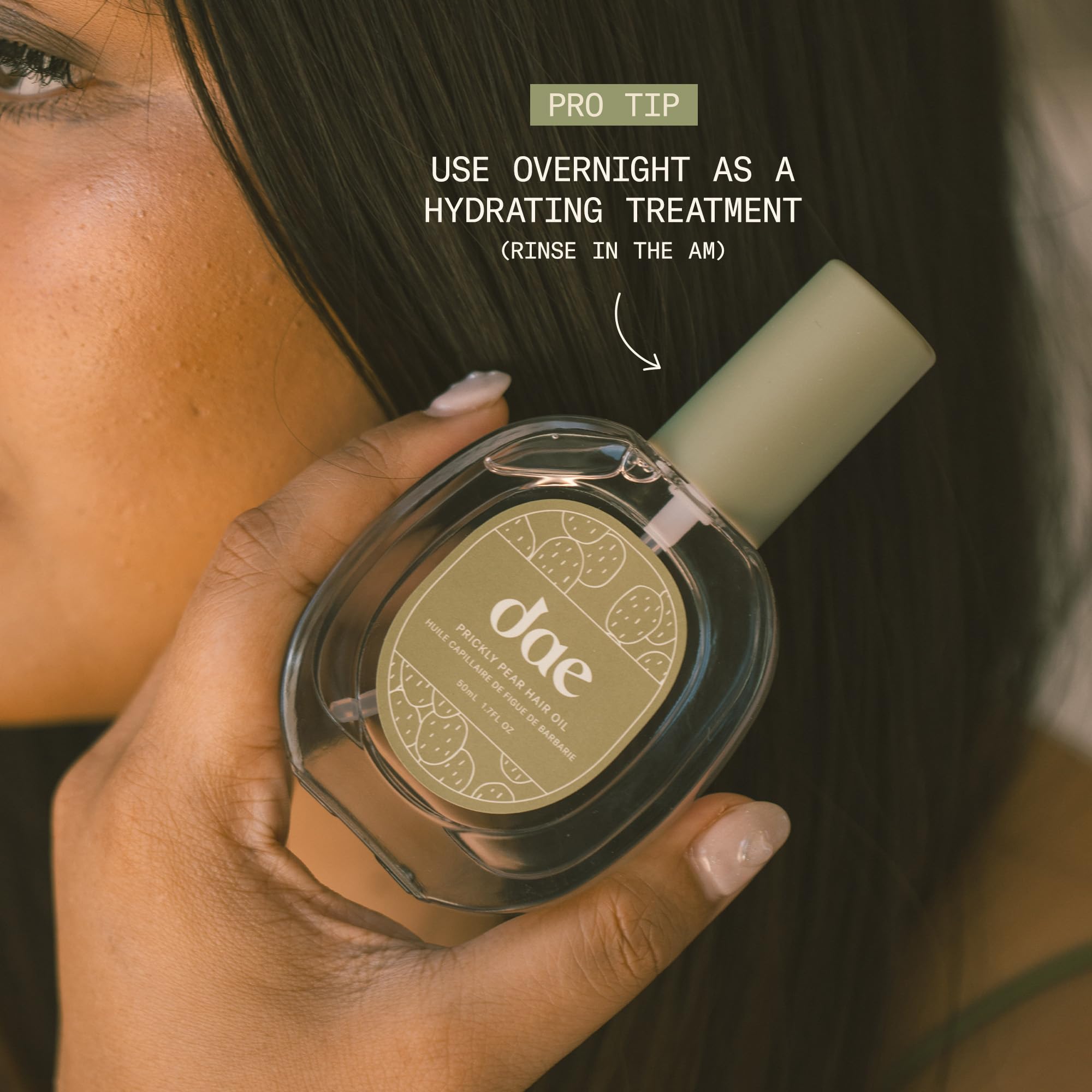DAE Prickly Pear Hair Oil dropper-cap—layering for added shine and frizz control.