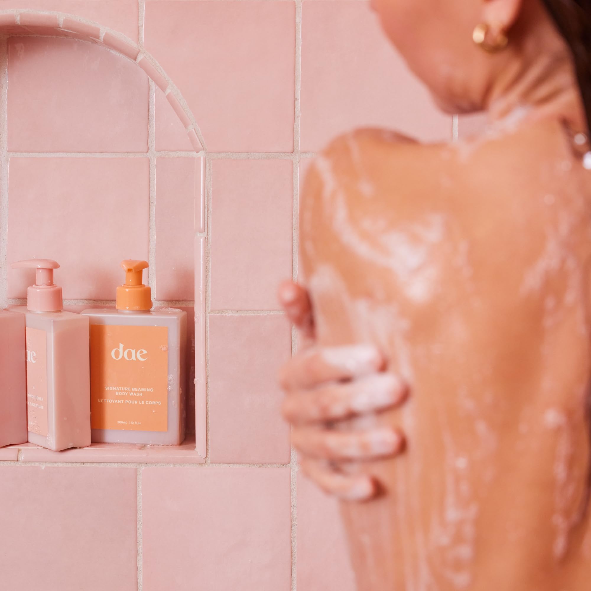 Close-up of rich lather from DAE Beaming Body Wash delivering nourishing suds