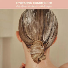 DAE Signature Conditioner bottle side view for easy detangling on the go
