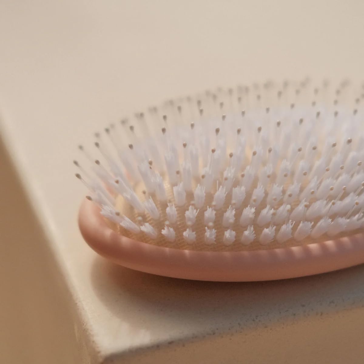 DAE Vegan Detangle + Style Brush dry-hair-use shows gentle styling for dry hair.