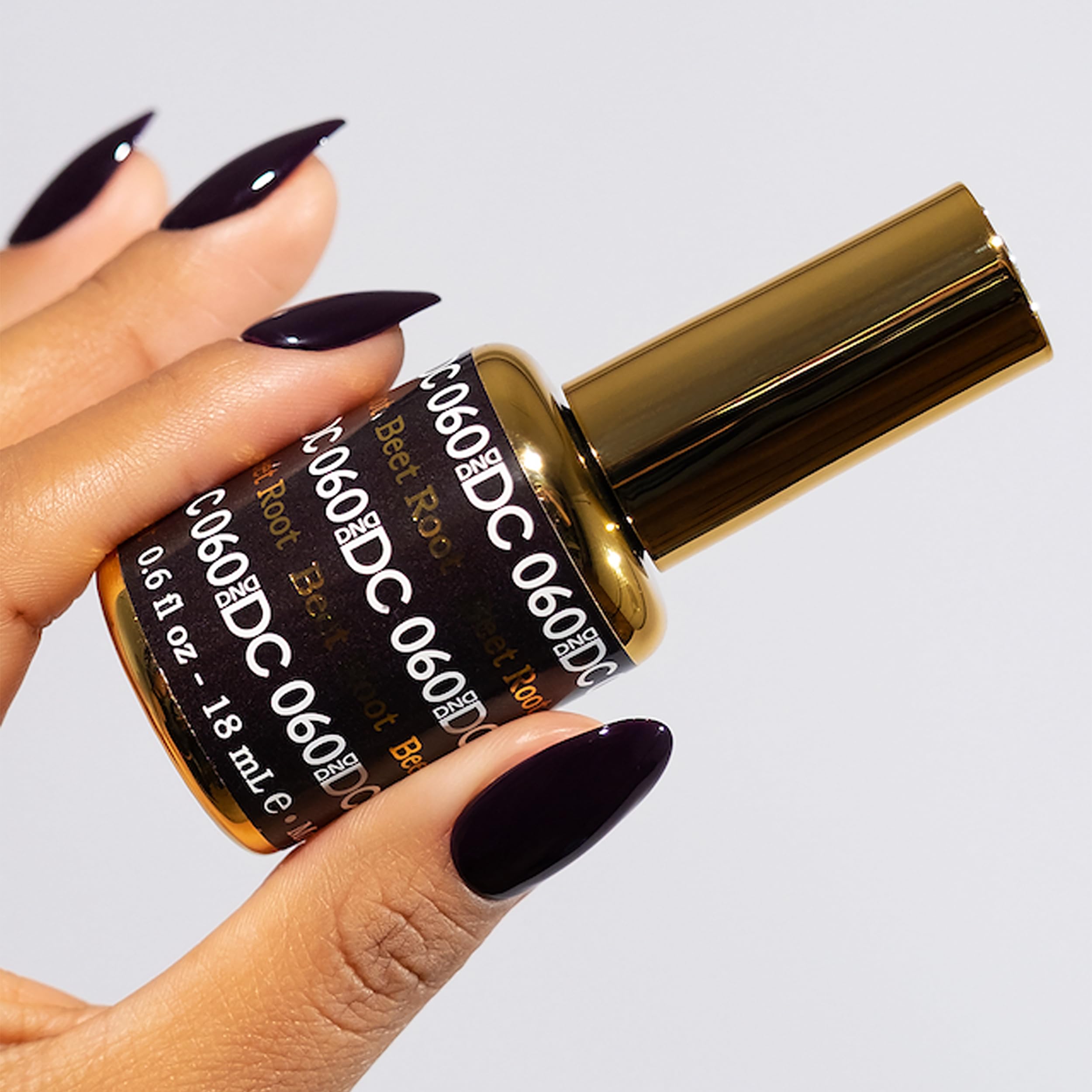 DAISY DND Beet Root gel polish application demonstrates smooth, even finish.