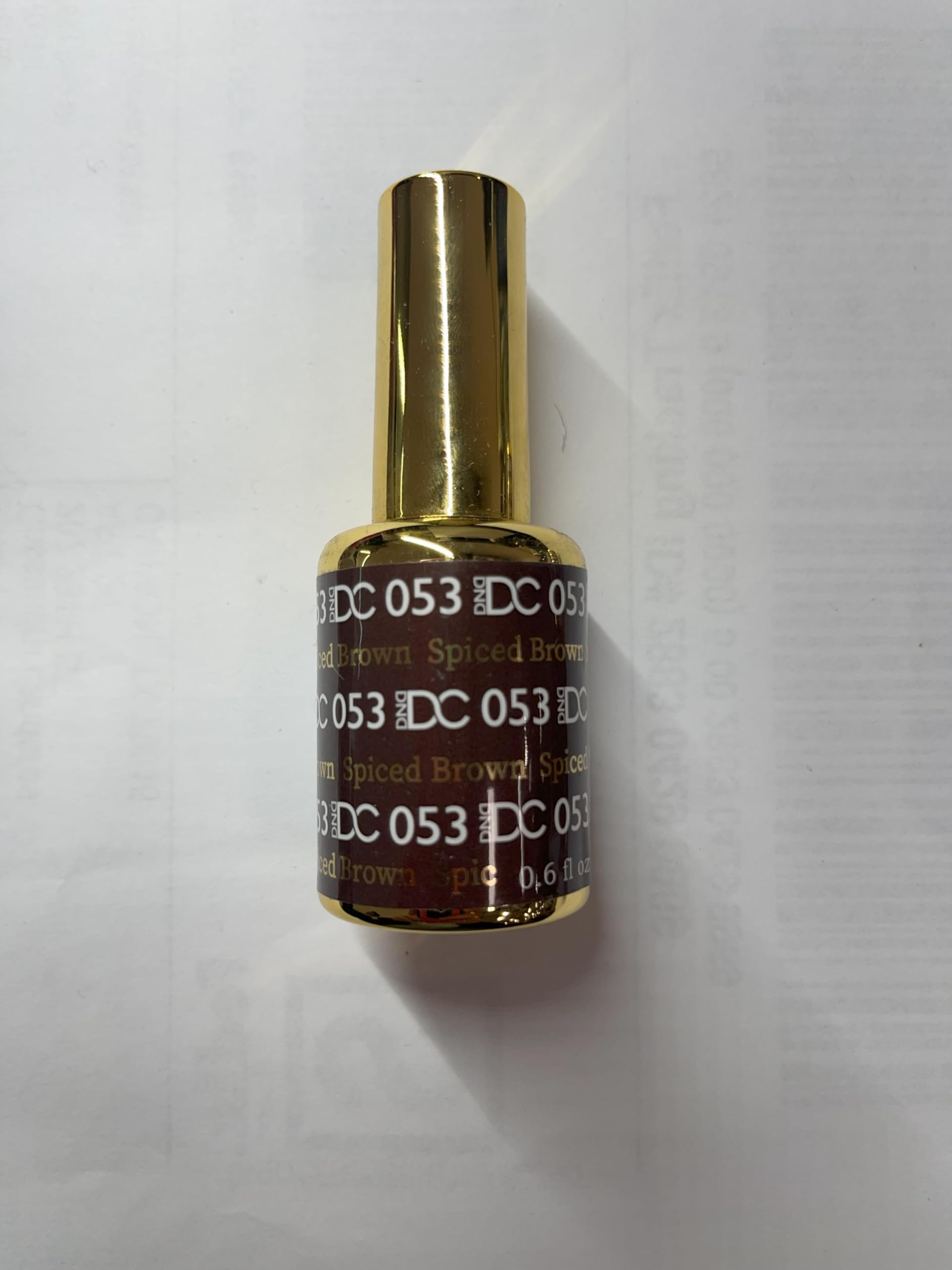 Daisy DND Walnut Brown under UV/LED cure demonstrating fast set.