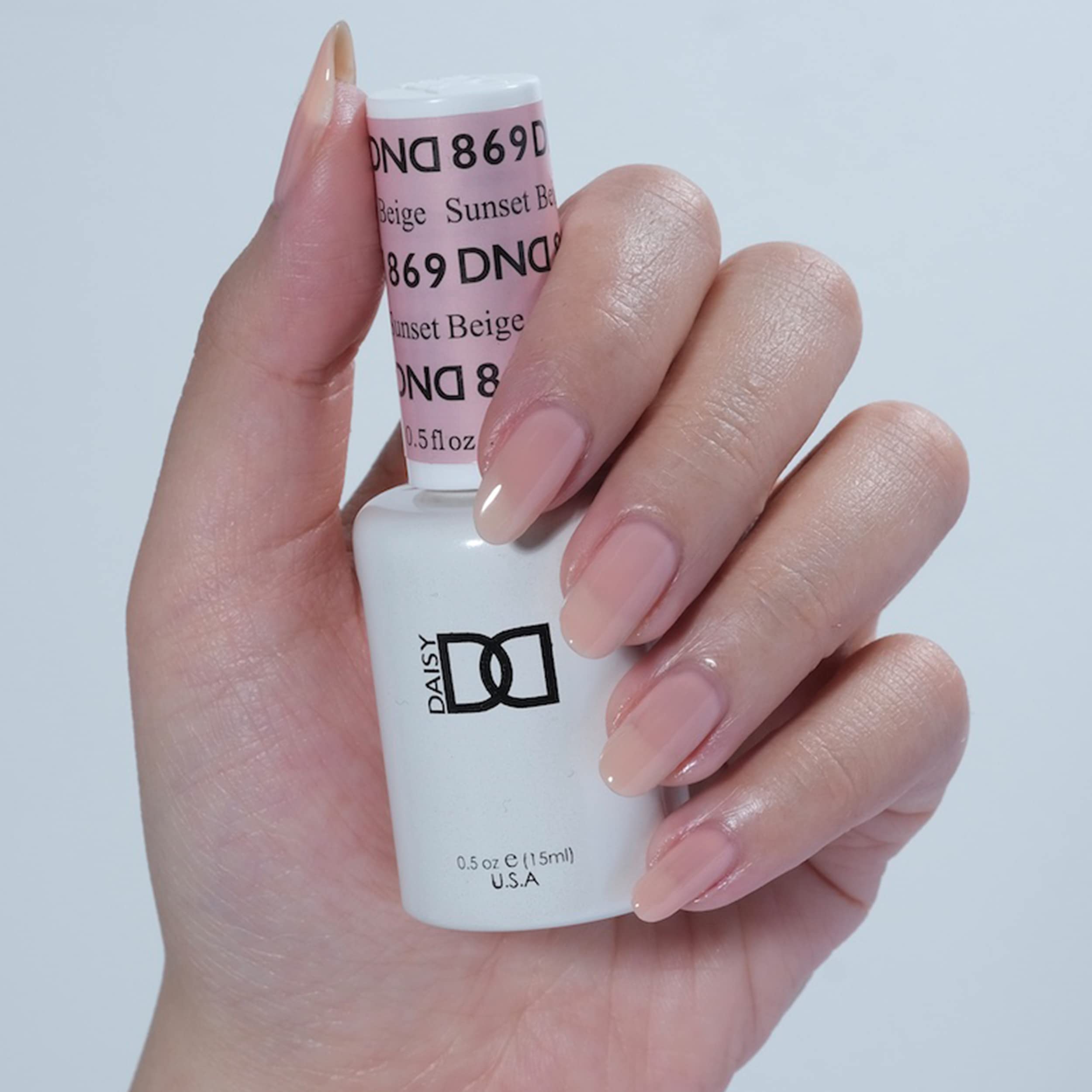DAISY DND Sunset Beige lacquer swatch pairs with gel polish for a coordinated look.