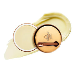 Danessa Myricks Yummy Skin Radiant bottle closeup showing translucent glow and pore-refining potential