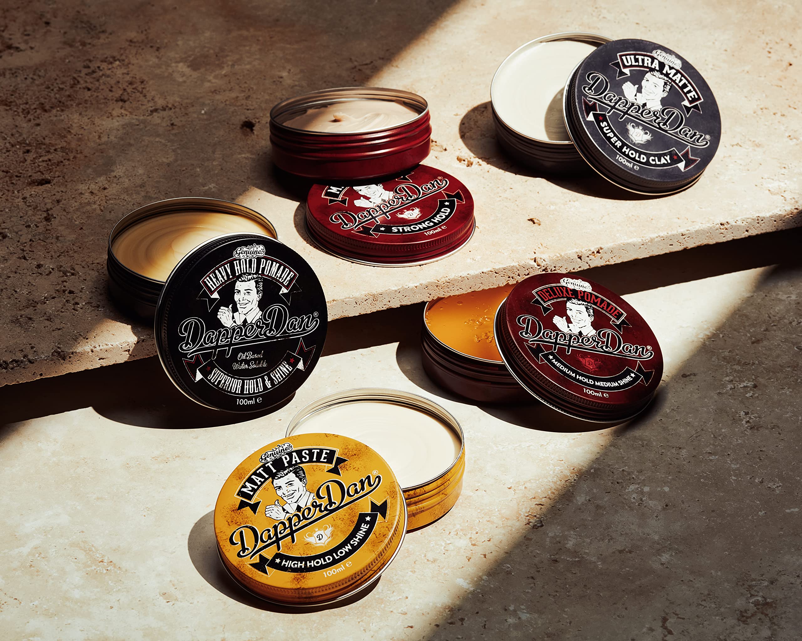 Dapper Dan Deluxe Pomade fragrance citrus vanilla image communicates scent during styling.