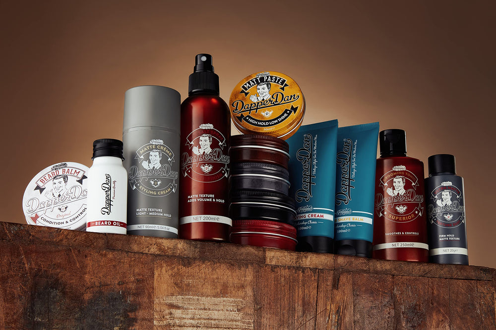 Dapper Dan Deluxe Pomade 1930s look inspiration on model demonstrates classic styling versatility.