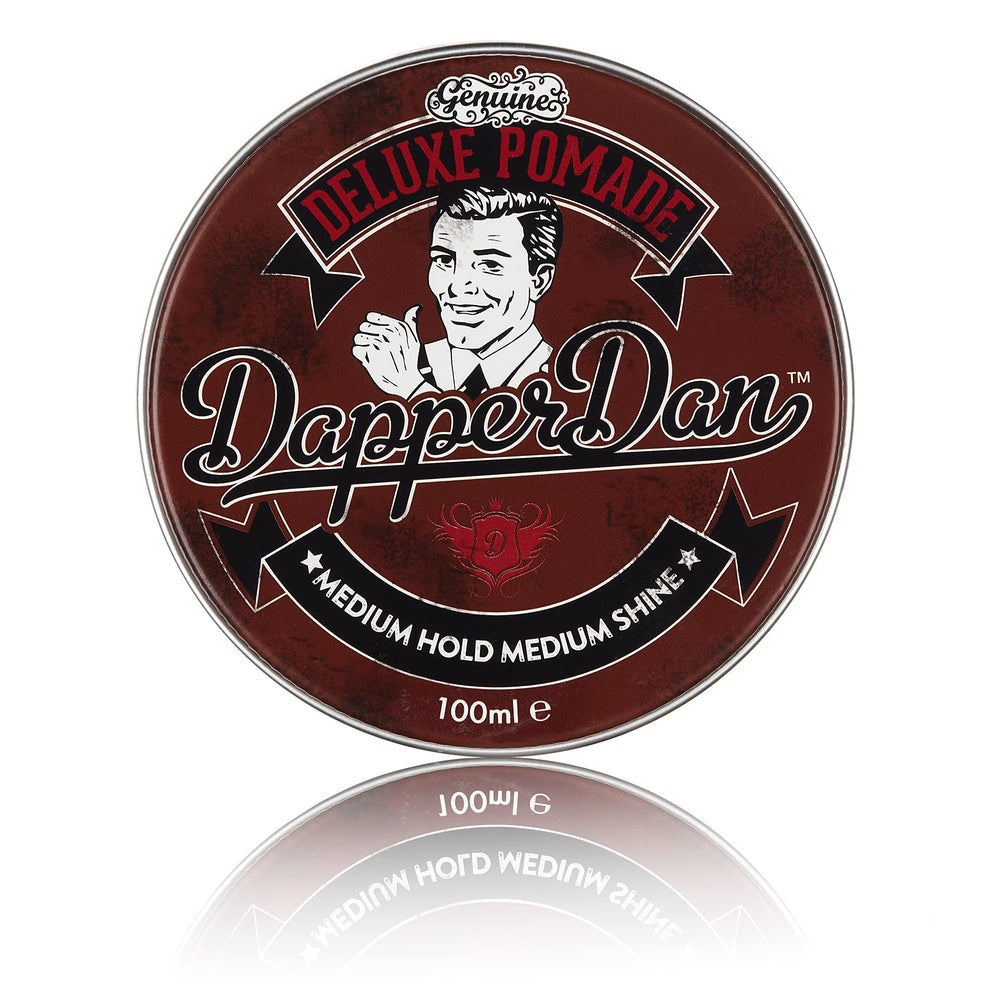 Dapper Dan Deluxe Pomade tube demonstrates smooth application for controlled hold and shine.