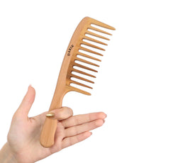 Darık Profesyonel Ahşap wide tooth comb handmade for gentle detangling and smooth styling.
