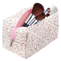 Dark Swan cotton quilted makeup bag with pink floral pattern, stylish travel companion.