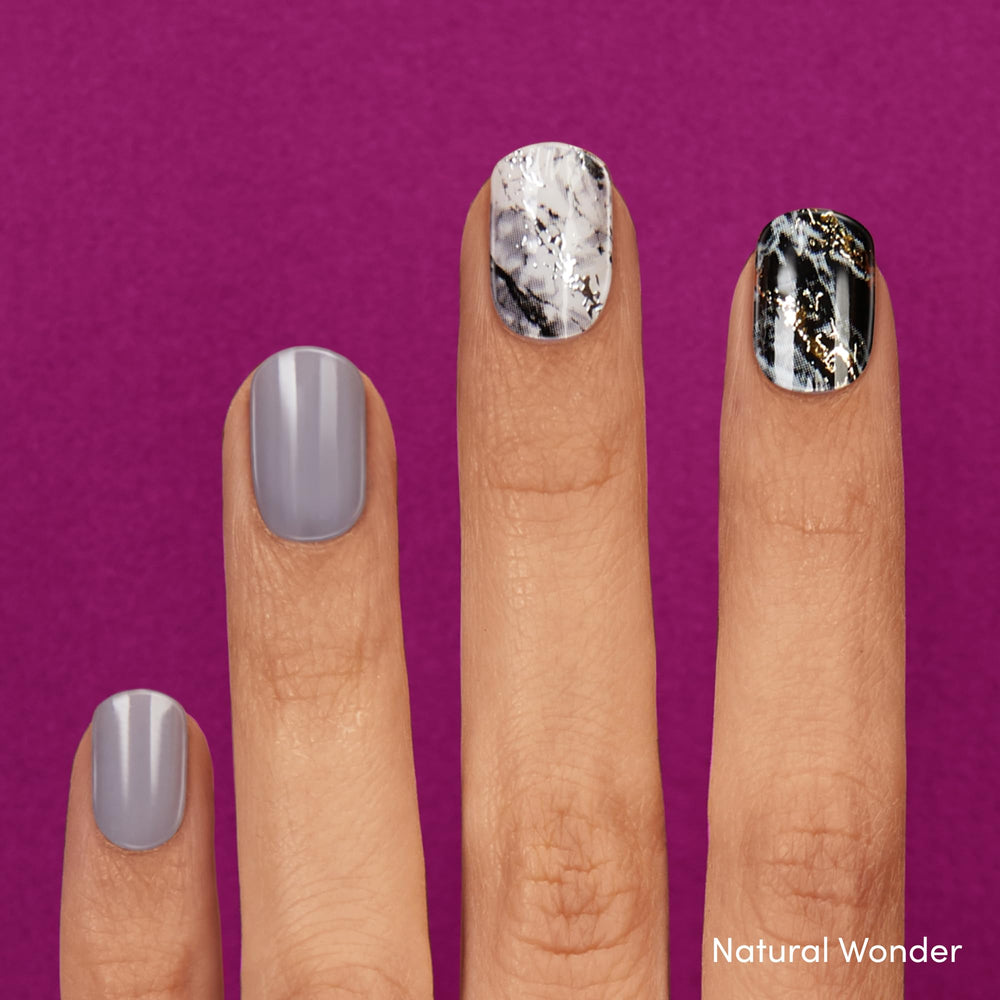 Dashing Diva Gloss Ivy Opal set on nails features marble pattern and glossy wear