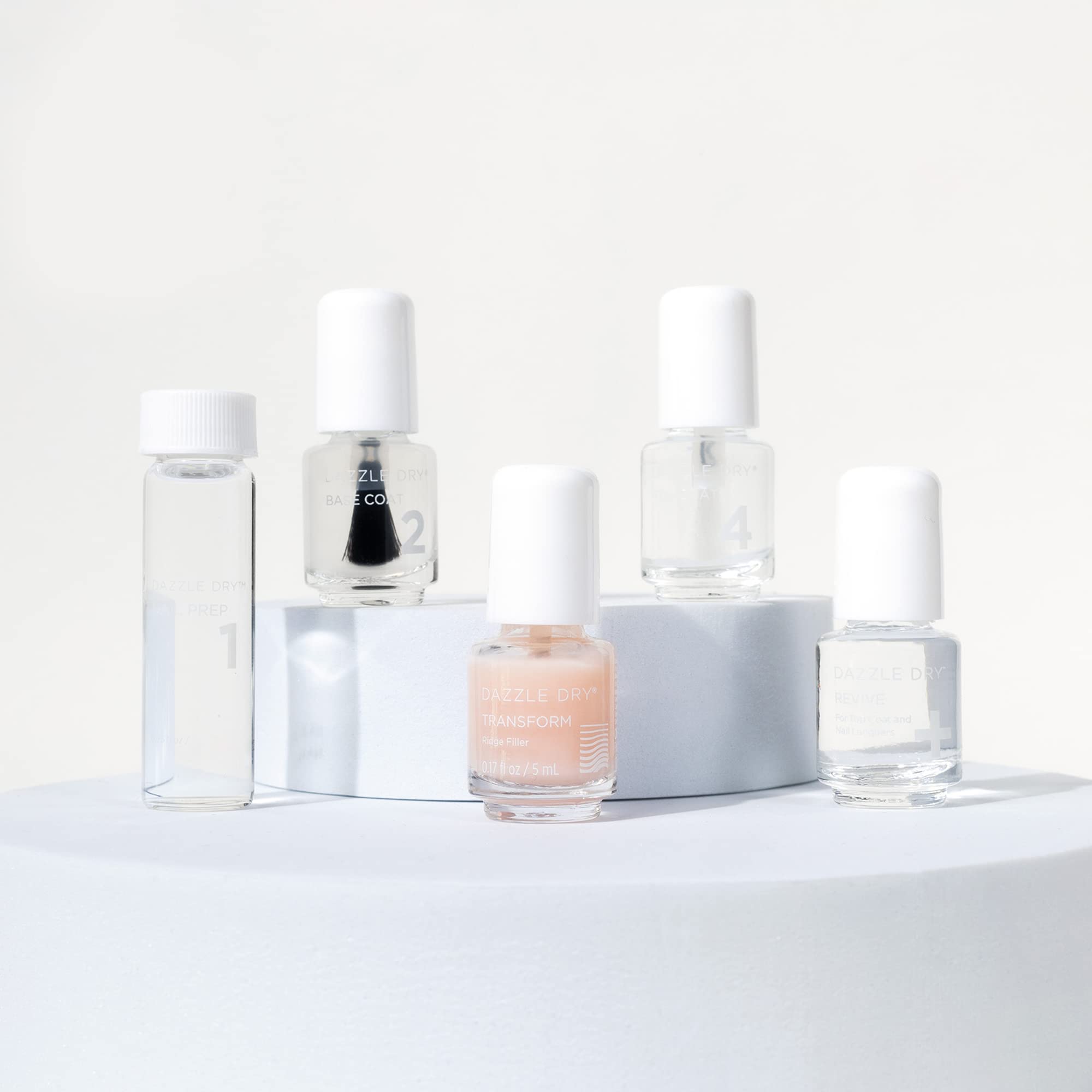 Dazzle Dry colour lacquer application highlights quick-dry pigments for vibrant, chip-resistant color.