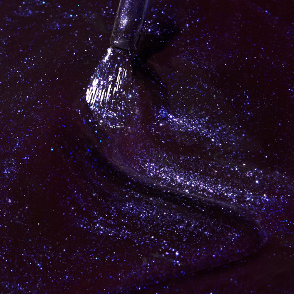 Dazzle Dry Fast Lane brush stroke on nail demonstrates full-coverage shimmer.