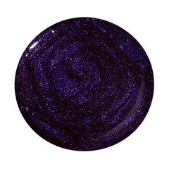 Dazzle Dry Fast Lane deep purple glitter swatch reveals flaky glitter for evening glam.