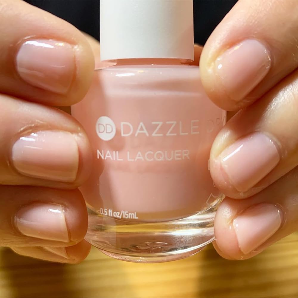 Dazzle Dry Livin’ La Vida Yoga nail close-up reveals soft cream with shimmer