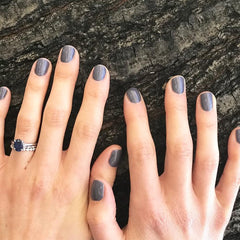 Dazzle Dry Anticipation opaque dark slate gray shade with purple undertones for sophisticated nails.