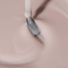 Dazzle Dry swatch shows sheer neutral tone you can layer
