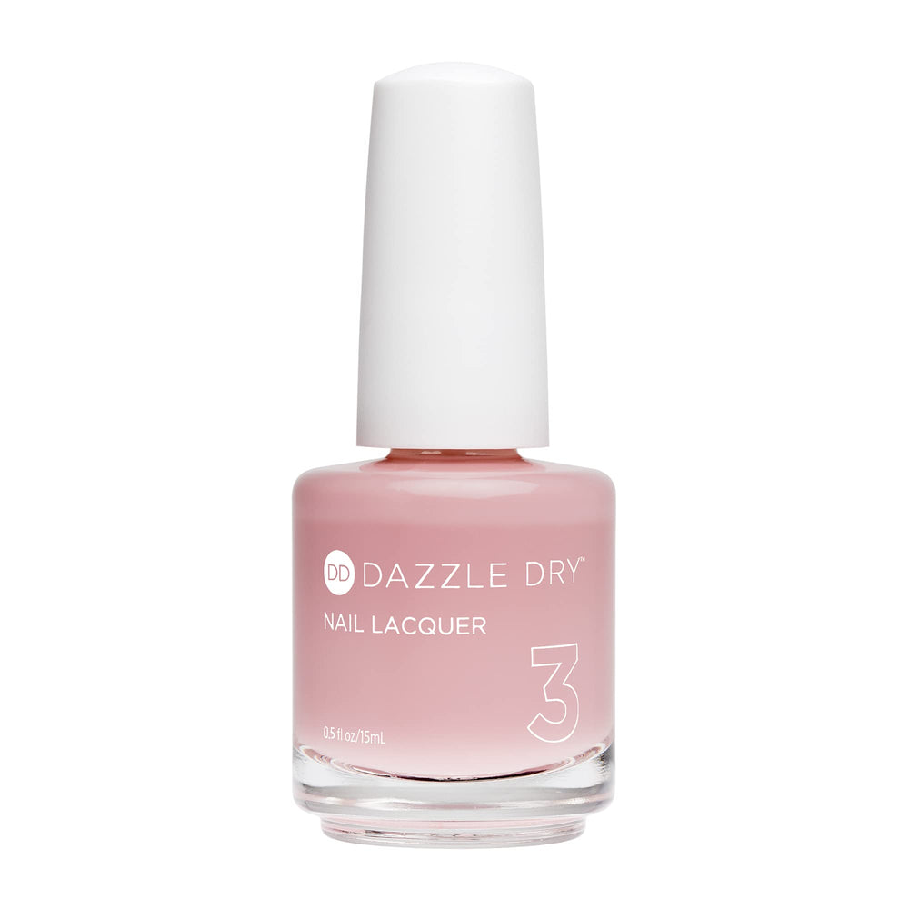 Dazzle Dry Nail Lacquer Step 3 Mind Your Mani pale nude bottle ideal for at-home salon-quality manicure.